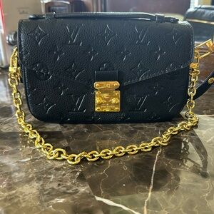 Black and gold embossed crossbody